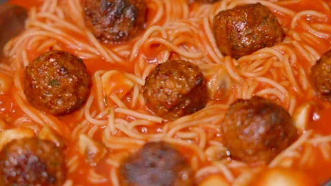 Top Down Rotating Shot of Italian Meatballs with Spaghetti Pasta in Rich Tomato Stock Footage 301059211