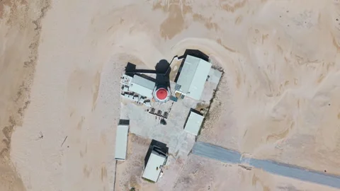 Top-Down Rotating Shot of Lighthouse Above Beach Stock Footage 306262105