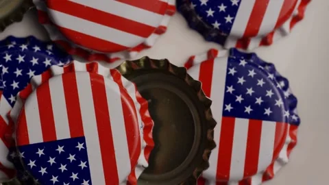 Top down rotation of pile of USA bottle caps Stock Footage 327910422