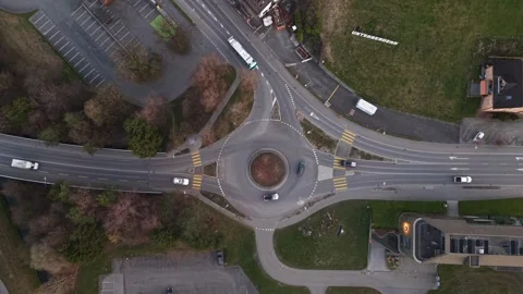 Top Down Roundabout With Light Morning Traffic Flow Aerial View Stock Footage 331441549