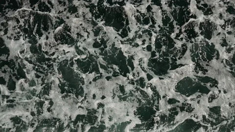 Top down sea foam texture from a ship wake in Alaska Video stock 347827794