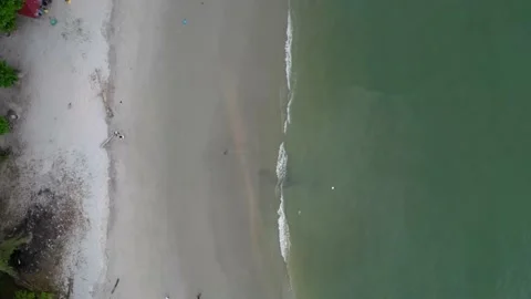 Top Down shot of the beach view with local people Stock Footage 235971548