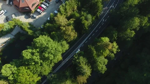 Top Down Shot Of The Car Driving Through The Small Village In The Mountain Stock Footage 116624830