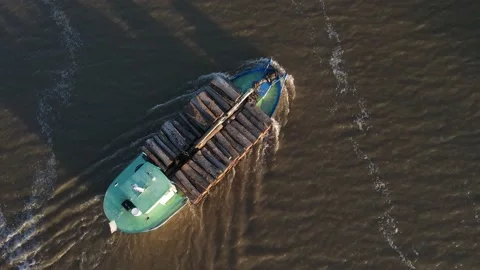 Top down shot of cargo ship navigating River in South America Stock-Footage 151703770