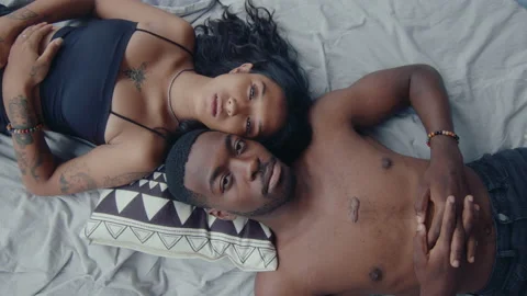 Top Down Shot of a Couple on Bed Stock Footage 236680030