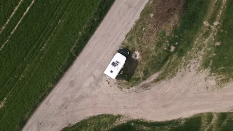 Top down shot of a drone ascending over ... | Stock Video | Pond5