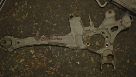 A top-down shot of a dusty and rusty car rear Stock Footage 340820875