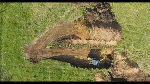 Top down shot of excavator removing soil during earth works Stock Footage 107655666
