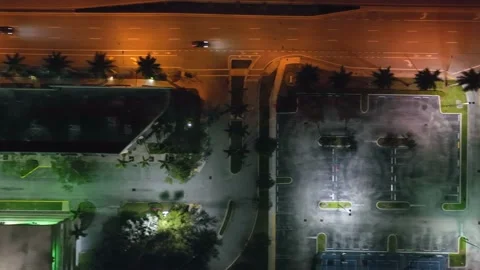 A top down shot high above a parking lot and office building, shot at Vídeos de archivo 171099499