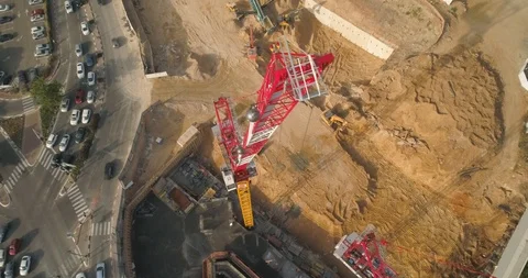 Top Down shot of Huge cranes at construction site very high buildings Video stock 97180716