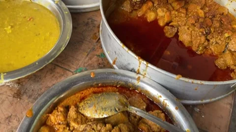 Top down shot Indian Buffett on display with various currys and other Video stock 228941220