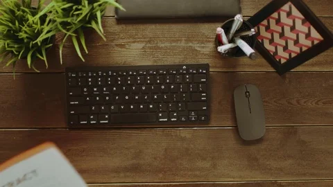 Top down shot of man reading contract while drinking coffee Stock Footage 81173557
