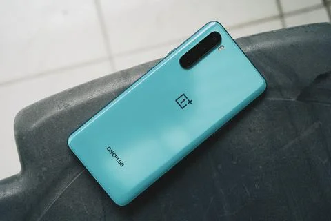 Top down shot of oneplus nord phone's backside Stock Photos