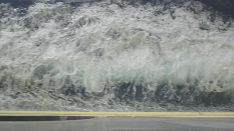 A top-down shot over the railing of a ferry at full speed Stock Footage 238845834
