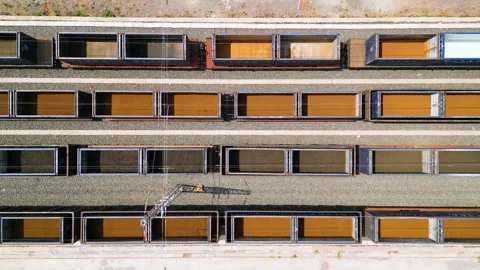 Top-down shot revealing the empty freight wagons halting the Laos economy Stock Footage 276722076