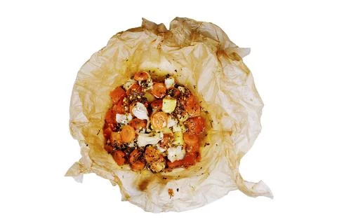 Top-down shot showcasing a selection of oven-baked vegetables nestled in parc Stock Photos