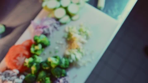 Top down shot of sliced vegetables on the cutting board Stock-Footage 104199366