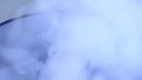 Top down shot of smoke billowing out of bowl in macro Stock-Footage 70672644