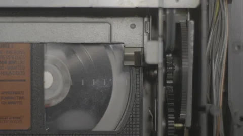 Top down Shot VHS player Tape Playing Stock Footage 130337001