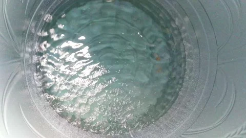 A top-down shot of a water tank being tested by releasing clean water into .. Stock Footage 300075250