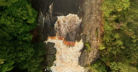 Top down shot of a waterfall in full spate Video stock 321711828