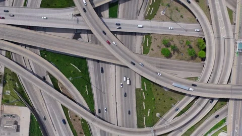 Top down showing car traffic driving on complex interstate highway interchange, Stock Footage 337312470
