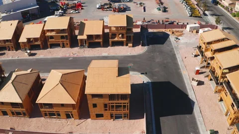 Top down sideways drone aerial shot of Las Vegas houses under construction Stock Footage 197387558