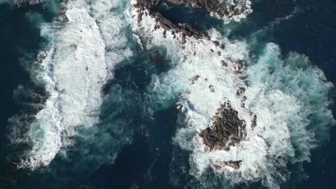 Top Down Slow Motion View, Ocean Waves Crashing Against Volcanic Rocks Stock Footage 341670051