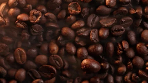 Top Down Smokey Ungrounded Fragrant Roasted Coffee Beans, Macro Close Up 스톡 동영상 307702313