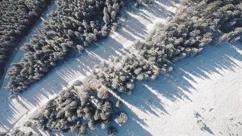 Top down snow mountain ski slope resort aerial. Tourists active sport. People at Fotos Stock