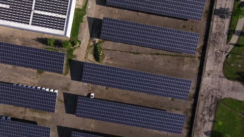 Top Down Solar Panel Rows Beside Modern Data Center Video stock 336400980