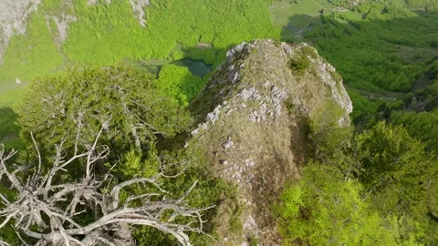 Top down spinning shot mountain ridge in the valley Stock Footage 250000699