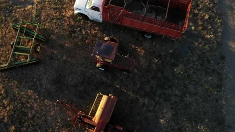 Top Down Spiraling Out Move over Old Farm Truck and Implements - Aerial Drone Stock Footage 199194981