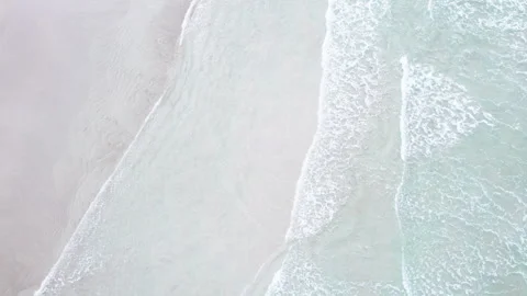 Top down static drone shot of ocean waves washing shore The Concept of coas.. Stock Footage 346470675