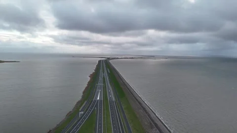 Top down static shot of dam road and passing traffic Stock Footage 331828827