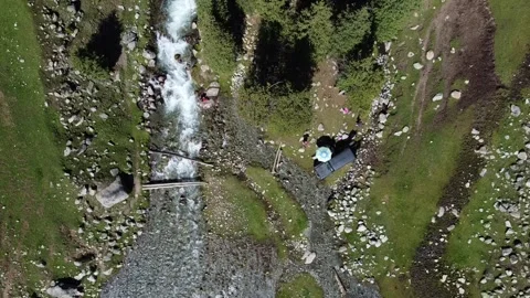 Top Down Static View Of Alpine River Camp. Kyrgyzstan, Suttuu-Bulak Lake Stock Footage 332943653