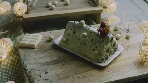 Top down styling with cake and white chocolate bar Stock Footage 342129579