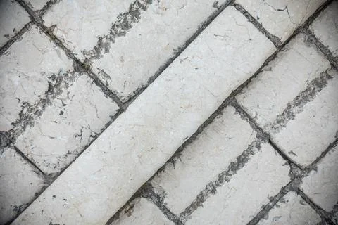Top-Down Tenelija Stone Pathway with Diagonal Pattern in Old Town Mostar 库存照片