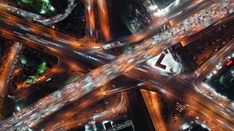 Top-down time-lapse view of fast-moving cars on a highway Stock Footage 246419864