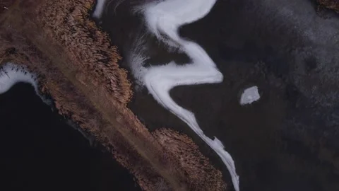 Top Down Tracking Shot of a Frozen Landscape Stock Footage 229009484