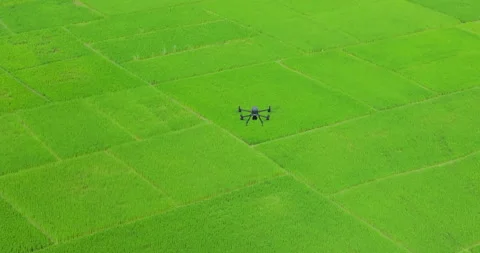 Top-down tracking shot of modern engineering and mapping drone gliding over Stock Footage 337392970