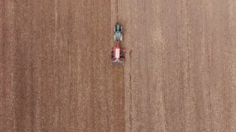Top Down Tractor in Empty Field – Global Food Security and Resource Risk Stock Footage 318067999