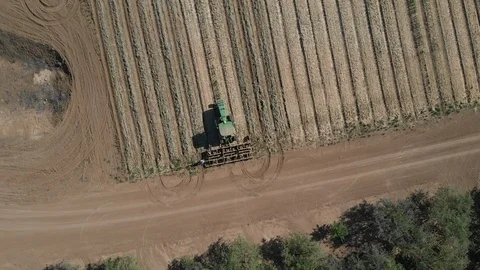 Top Down Of Tractor Plowing Field Stock Footage 89788229