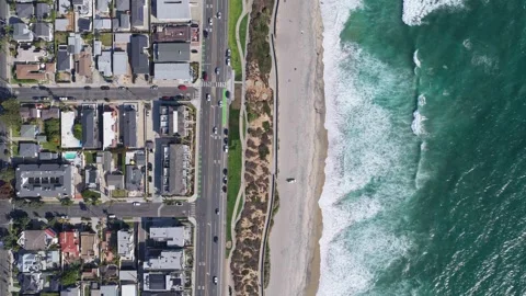 Top down from a tripod showing Carlsbad California coastline with traffic on Pac Stock Footage 336437360