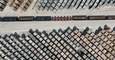 Top down vertical stacks railroad ties set out drying some train cars between Stock Footage 335669820