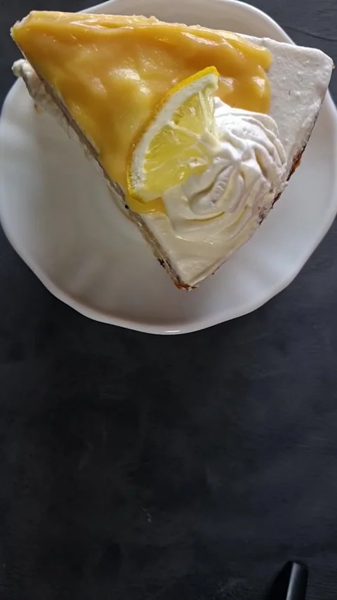 Top Down Video of Lemon Blueberry Cake with Whipped Cream Frosting and Lemon Stock Footage 336149643
