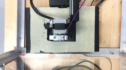 Top down view of 3D printer in action 4k Stock Footage 102537468
