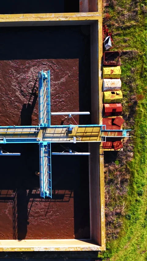 Top down view of aeration tank with blue walkway Vertical video. Stock-Footage 332343926