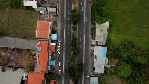 Top down view aerial road in cloudy day in Bali Stock Footage 154554038