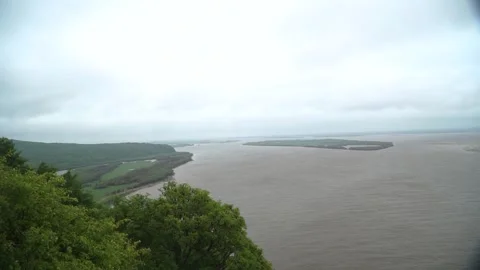 Top Down view of Amur River. Trees and rock mountains Stock Footage 315192685